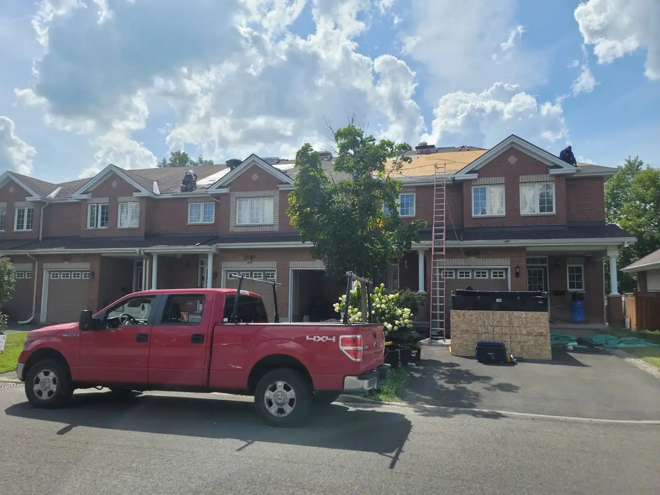 The Ready Roofing & Renovations crew at work on a residential roof.