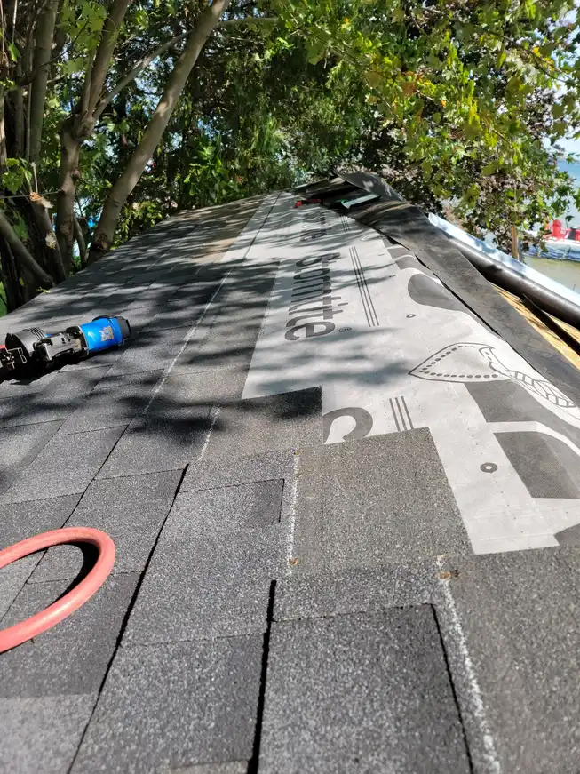 A residential roof completed by the Ready Roofing & Renovations crew.